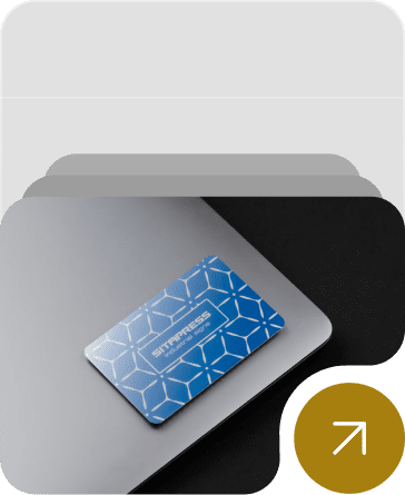 Vibrant blue aluminum business card with a geometric pattern and SITAPRESS branding.
