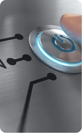 Close-up of a finger pressing a high-precision illuminated metal power button on a brushed surface.